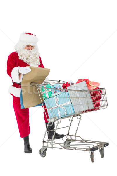 Santa delivering gifts with a trolley Stock photo © wavebreak_media