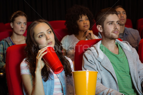 Jovem amigos assistindo filme cinema feliz Foto stock © wavebreak_media
