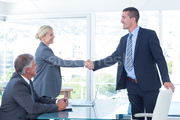 Stock photo: Business partners shaking hands