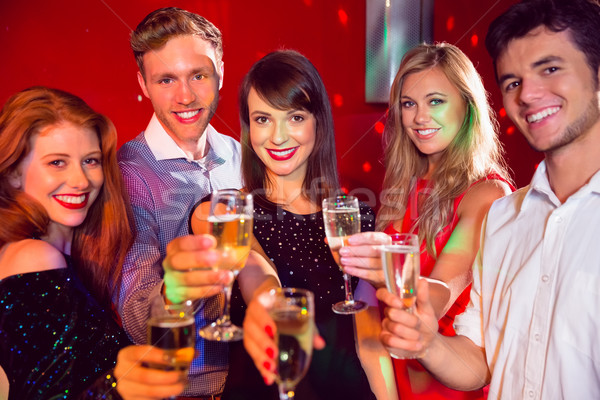 Happy friends on a night out together Stock photo © wavebreak_media