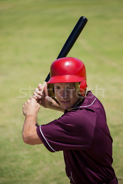 Joueur de baseball bat domaine ciel herbe homme [[stock_photo]] © wavebreak_media