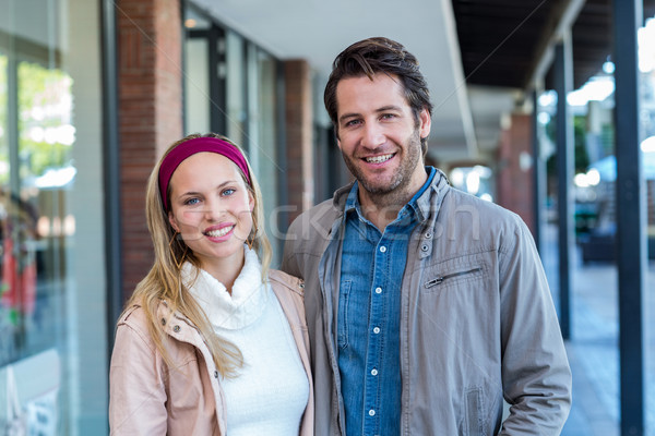 Smiling couple looking at camera Stock photo © wavebreak_media