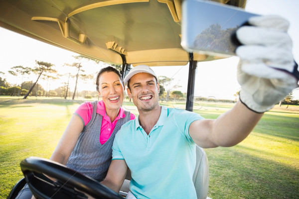 Stockfoto: Golfer · paar · vergadering · golf · glimlachend