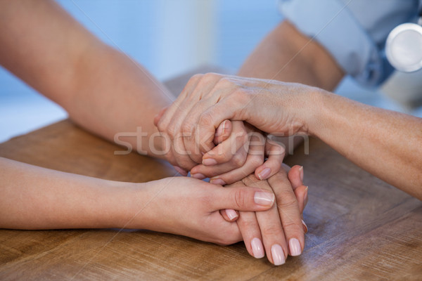 Close-up of female doctor consoling a patient Stock photo © wavebreak_media