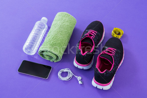 Сток-фото: кроссовки · фляга · полотенце · мобильного · телефона · наушники