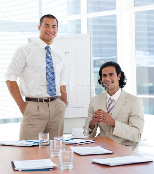 Smiling businessman giving a presentation Stock photo © wavebreak_media