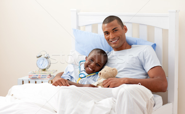 Father with his sick child Stock photo © wavebreak_media