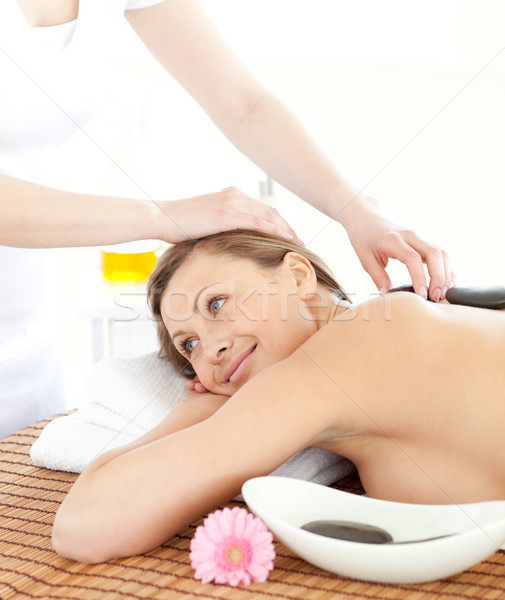 Portret zamyślony kobieta masażu kamienie spa Zdjęcia stock © wavebreak_media