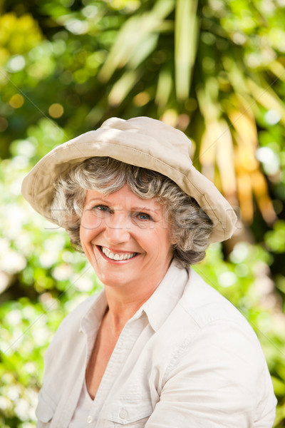 Pretty senior woman looking at the camera Stock photo © wavebreak_media