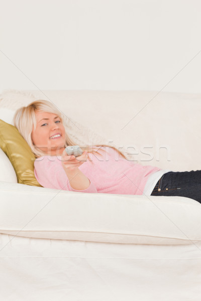 красивый позируют диван гостиной женщину Сток-фото © wavebreak_media