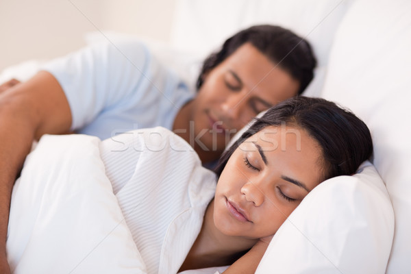 Stock photo: Side view of young couple being asleep