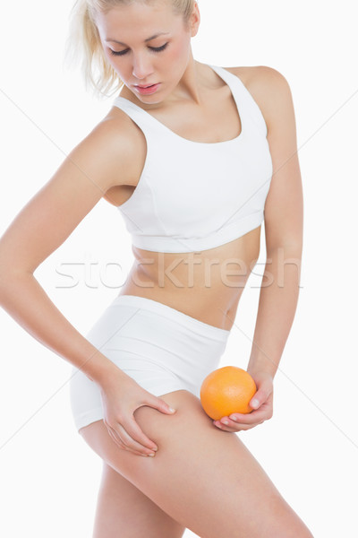 [[stock_photo]]: Femme · sur · grasse · cuisse · orange · belle