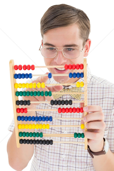 Nerdy hipster adding on abacus  Stock photo © wavebreak_media