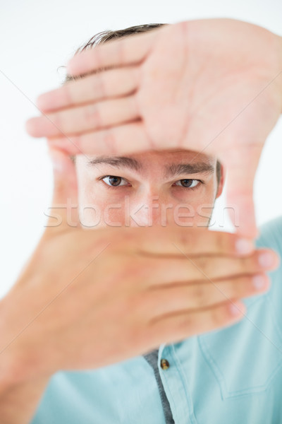 Jeune homme cadre mains portrait [[stock_photo]] © wavebreak_media