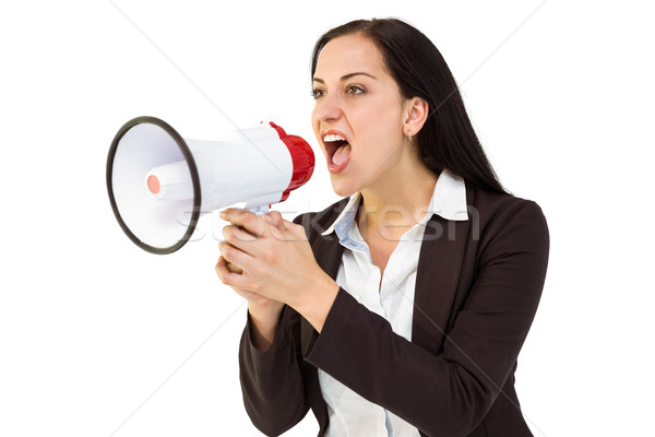 Stock photo: Pretty businesswoman shouting with megaphone