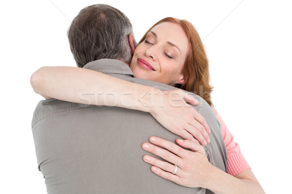 Casual couple hugging each other Stock photo © wavebreak_media