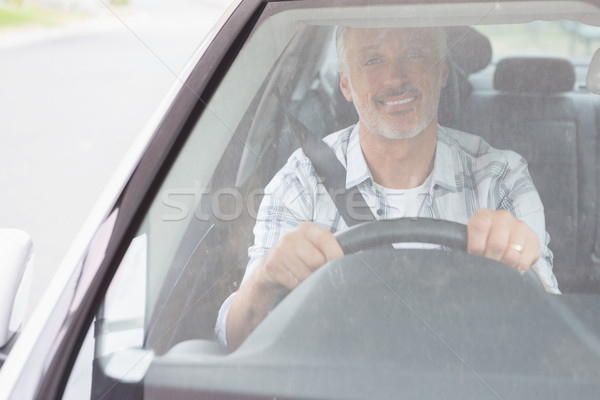 Hombre sonriendo conducción coche carretera feliz Foto stock © wavebreak_media