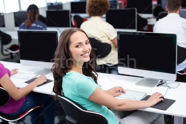 студент улыбаясь камеры компьютер класс женщины Сток-фото © wavebreak_media