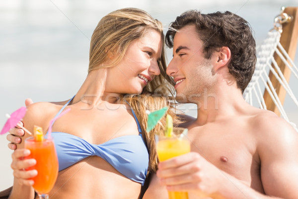 Happy couple napping together in the hammock Stock photo © wavebreak_media