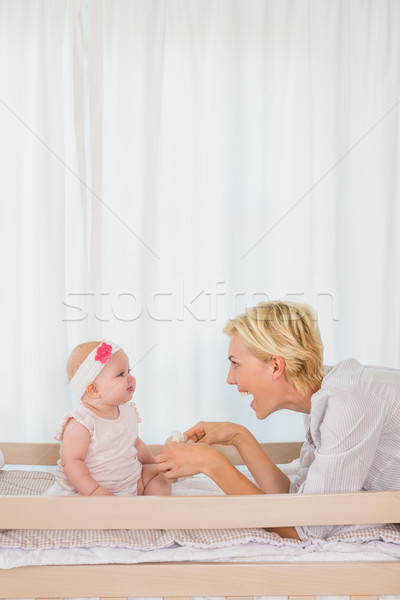 Happy mother with her baby girl  Stock photo © wavebreak_media