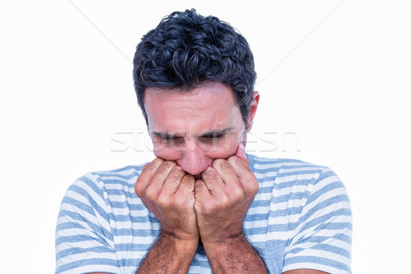 Stressed man with hands in front of his mouth Stock photo © wavebreak_media