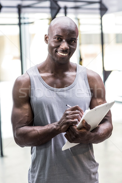 Foto d'archivio: Sorridere · muscolare · iscritto · appunti · ritratto