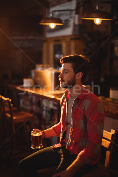 Thoughtful man having beer Stock photo © wavebreak_media