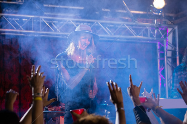 Singer performing on stage Stock photo © wavebreak_media