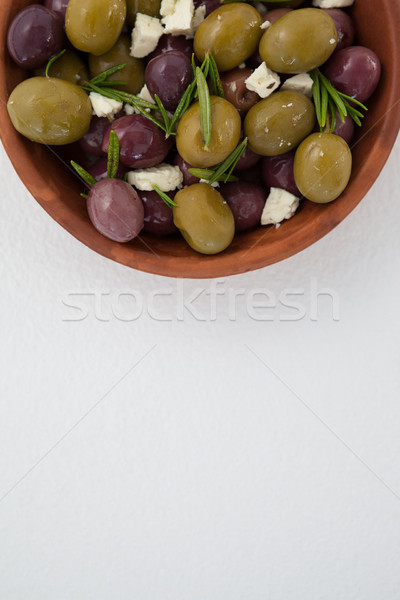 Overhead view of olives with herbs and cheese Stock photo © wavebreak_media