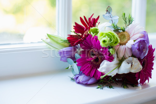 Bouquet of flower kept on window sill Stock photo © wavebreak_media