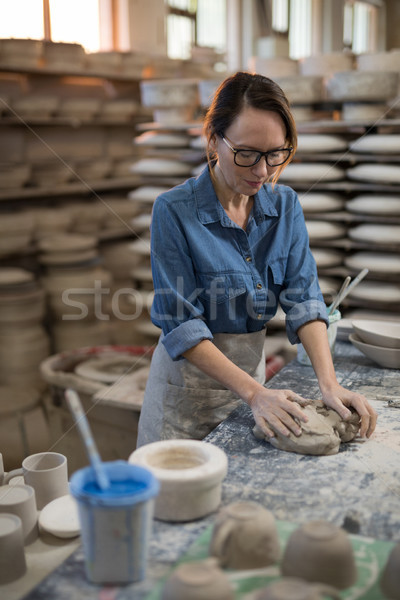 Female potter molding a clay Stock photo © wavebreak_media