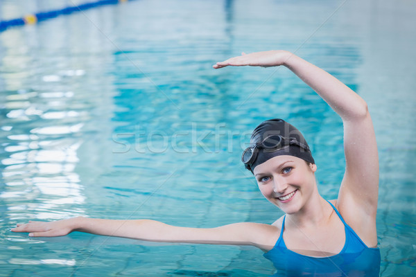 Potrivi femeie apă piscină fericit Imagine de stoc © wavebreak_media