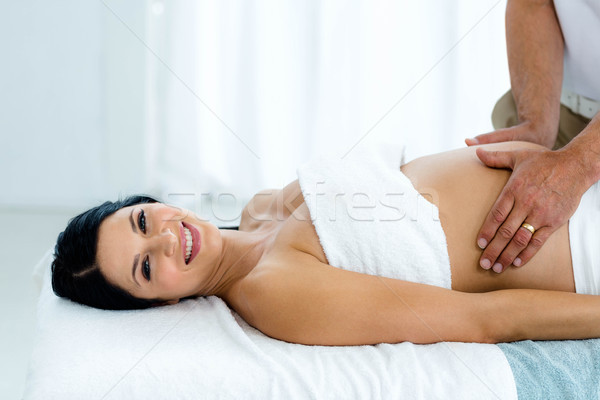 Kobieta w ciąży żołądka masażu masażysta domu ciało Zdjęcia stock © wavebreak_media