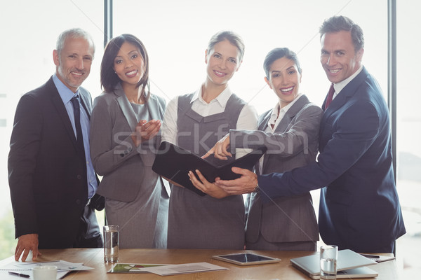 Businesswoman looking at organizer Stock photo © wavebreak_media