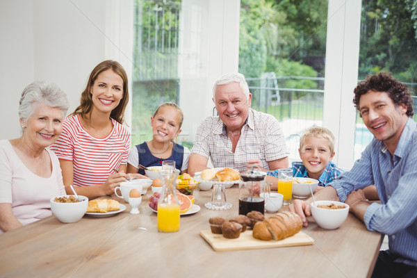Multi-generation family sitting at table during breakfast Stock photo © wavebreak_media