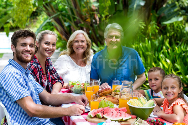 Famiglia felice pranzo ritratto amore uomo estate Foto d'archivio © wavebreak_media