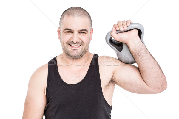 Bodybuilder lifting heavy kettlebell Stock photo © wavebreak_media
