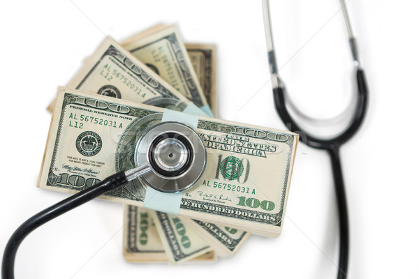 Stethoscope on bundle of currency note Stock photo © wavebreak_media