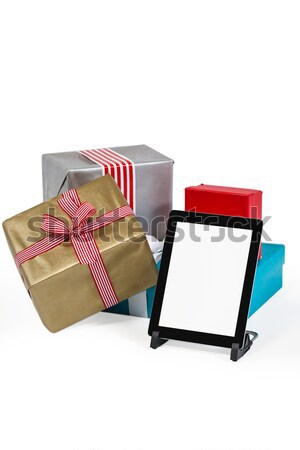 Christmas presents with digital tablet Stock photo © wavebreak_media