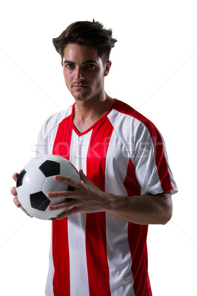 Football player holding football with both hands Stock photo © wavebreak_media