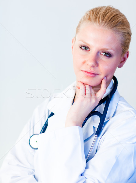 Stock photo: Young female doctor looking at camera