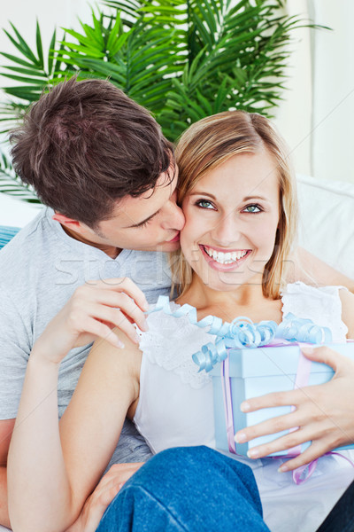 Pleased woman receive a present from her boyfriend  Stock photo © wavebreak_media