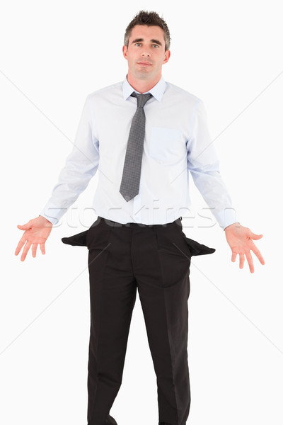 Portrait of a ruined businessman against a white background Stock photo © wavebreak_media