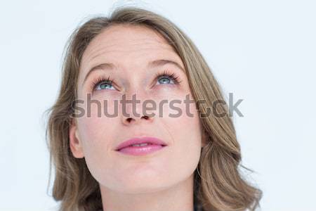 Ontdaan blonde vrouw staren camera witte gelukkig Stockfoto © wavebreak_media