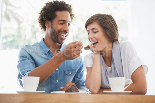 Casual couple having coffee together Stock photo © wavebreak_media