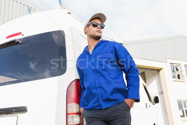 Bonito handyman posando óculos de sol tem Foto stock © wavebreak_media