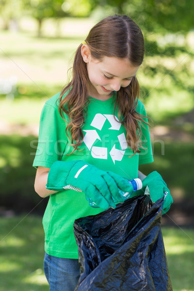 Happy little girl collecting rubbish  Stock photo © wavebreak_media