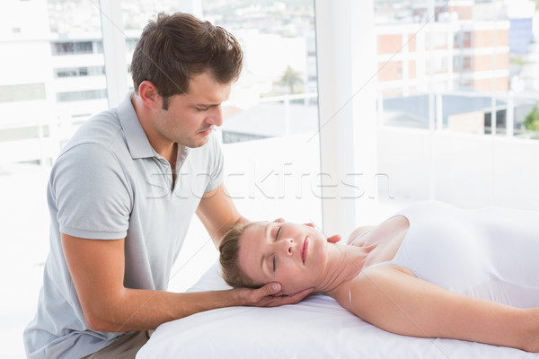 Donna collo massaggio spa centro nero Foto d'archivio © wavebreak_media