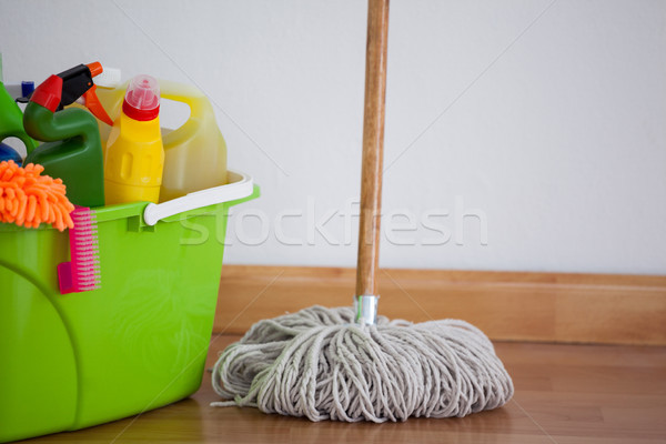 Mop and cleaning equipment on wooden floor Stock photo © wavebreak_media