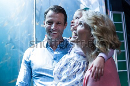Man shielding eyes against white background Stock photo © wavebreak_media